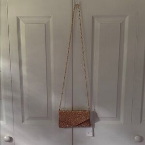 Rose gold rinstone clutch